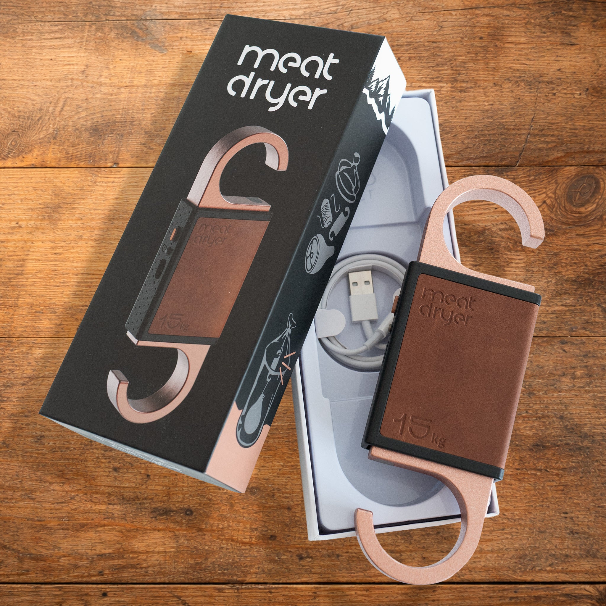 Meatdryer artisan product with packaging on a wooden surface