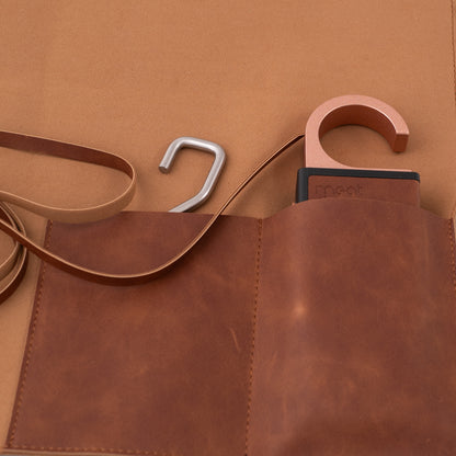 Brown leather tool roll with strap and Meatdryer smart hook
