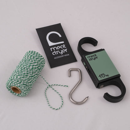 Meatdryer accessory hook with a roll of twine and a steel meat metal hook on a white background